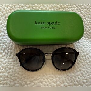 Black Kate spade. 
New with a box